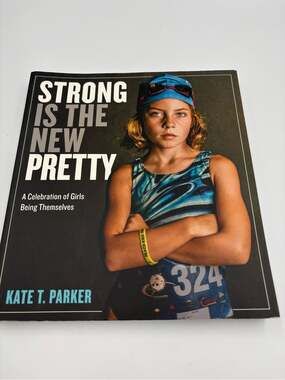 Strong Is The New Pretty Book by Kate T Parker. Great condition!